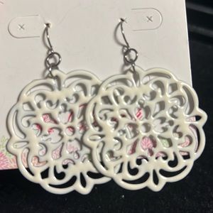 White doily style type earrings